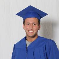 single man in cap and gown